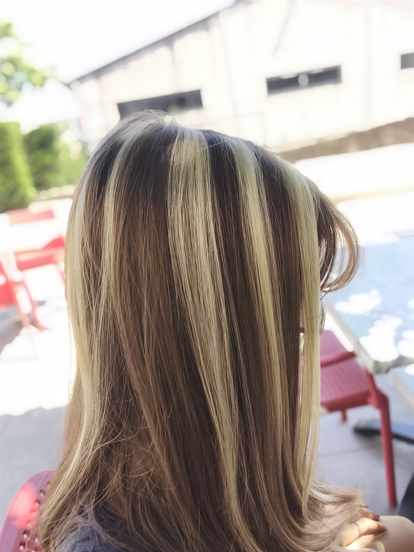 Mèches blondes sur cheveux châtains